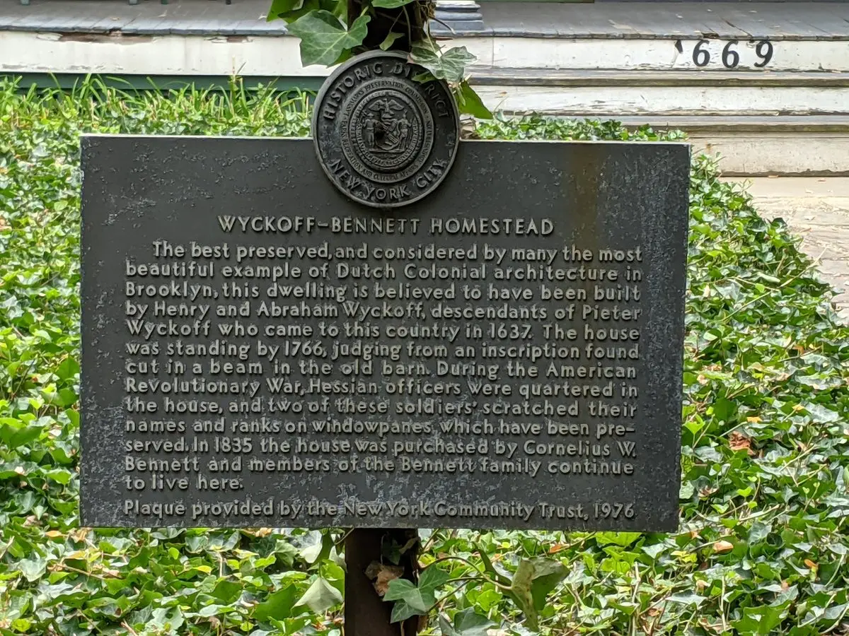 The historic landmark marker at the Wyckoff-Bennett Homestead