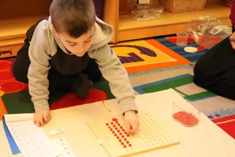 MATHEMATICS The child progresses from concrete to abstract through use of materials such as beads, spindle boxes and number rods.