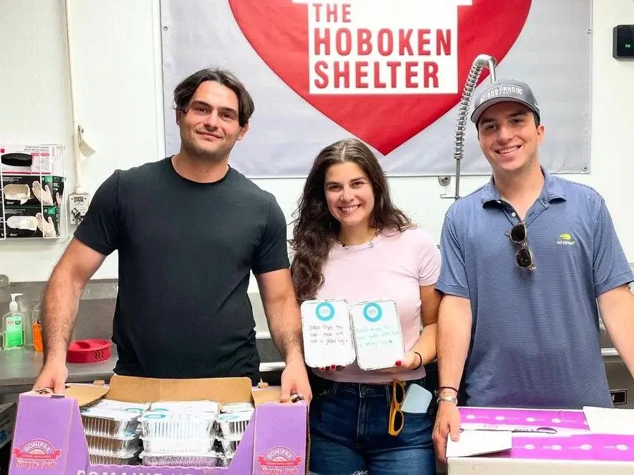 Volunteers delivering handwritten, freshly made meals to The Hoboken Shelter