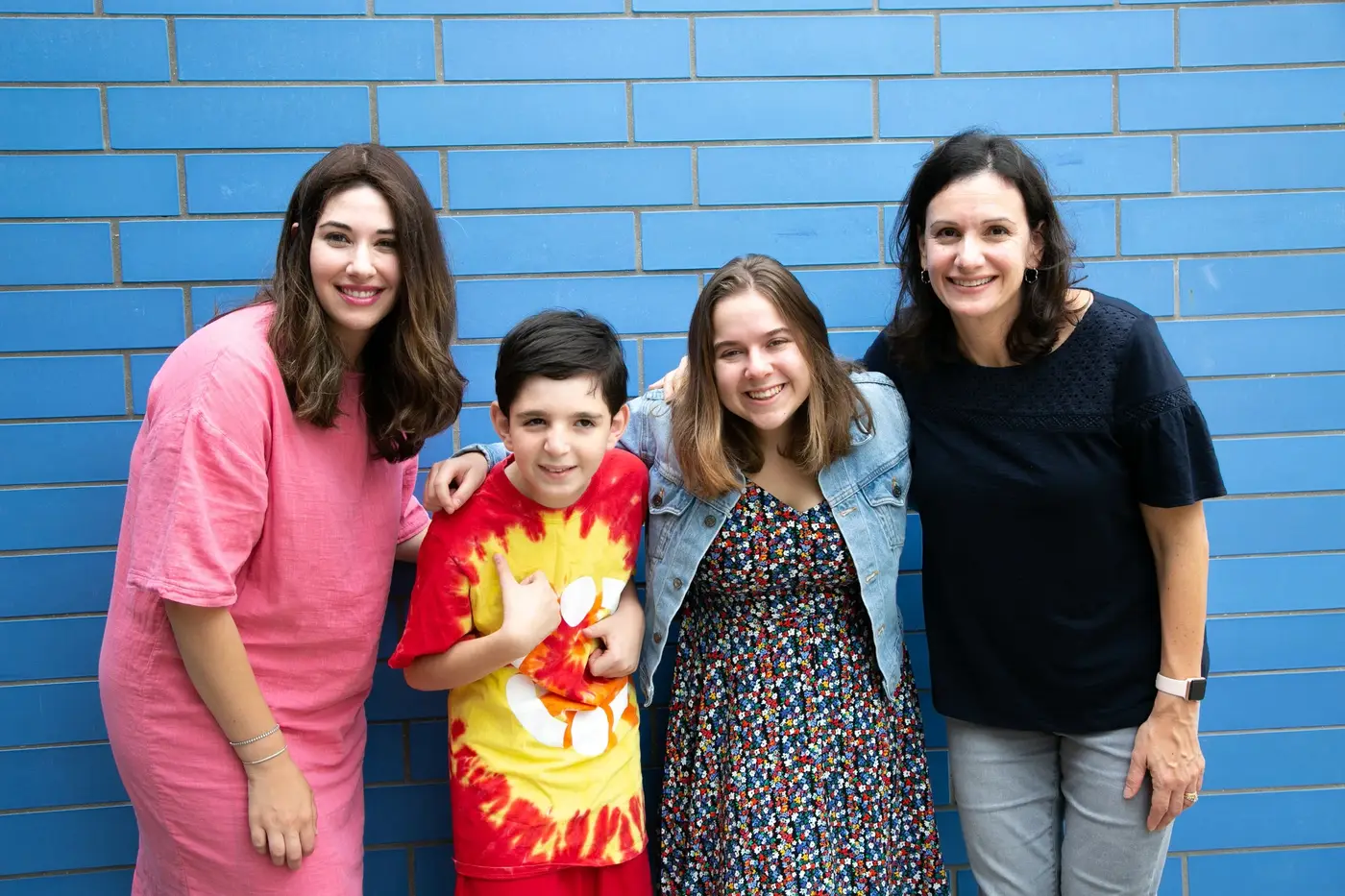 Pictured: Mrs. Dubrawsky (left) with two participants and a parent during a Friendship Circle event, August 2018.